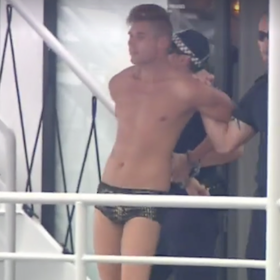 WATCH: Speedo-clad young man is possibly the craziest vacationer of all time