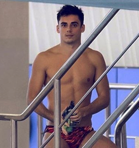 Olympic diver Chris Mears visits Cosmo office in tiny Speedo; staff goes bananas