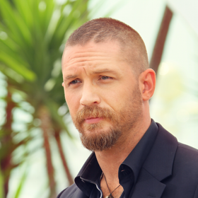 WATCH: Tom Hardy bends his stunt double over and lets him have it