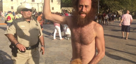 What happens when a cop discovers this Speedo-clad man riding his wooden horse around the Alamo?