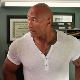 Zac Efron and The Rock share a kiss in new “Baywatch” red-band trailer
