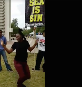Student shuts down angry antigay protestors by voguing at them in must-see video