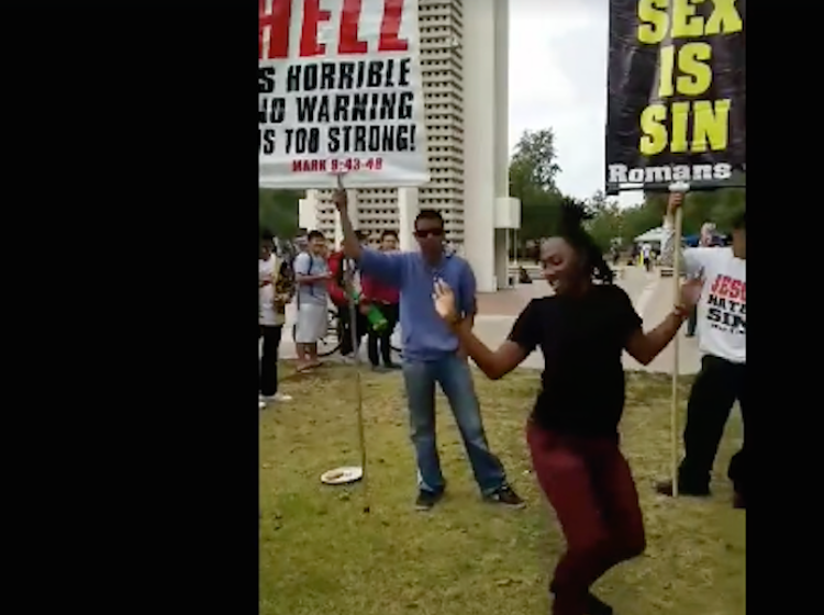 Student shuts down angry antigay protestors by voguing at them in must-see video