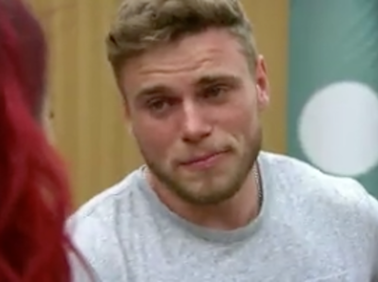 Gus Kenworthy breaks down while discussing his experiences coming out