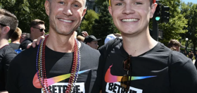 Gay coach and his gay teen son march together at Pride