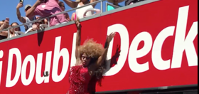 This drag queen leapt off a double-decker bus to do a full-on split, and whoa. Just whoa.