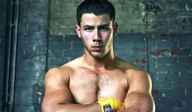 WATCH: Nick Jonas makes out with another guy in mixed martial arts drama "Kingdom"