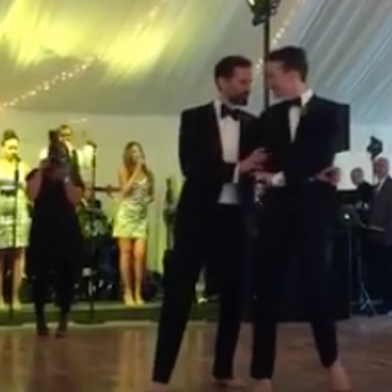 That time two adorable grooms wowed their wedding guests with their barefoot dancing skills