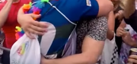 WATCH: Handsome gay rugby player proposes to equally handsome boyfriend at London Pride