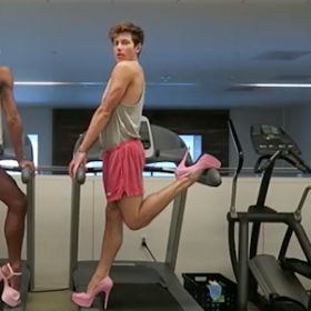 WATCH: Two men “work on their fitness” — in pink heels, no less