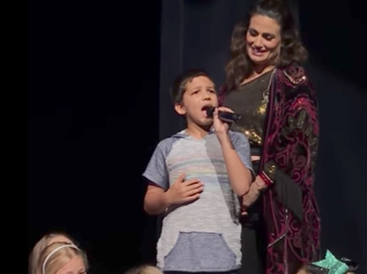 Young boy in the front row out-divas Idina Menzel, and she’s living for it