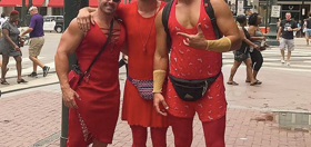 PHOTOS: Thousands of musclebound men put on skimpy red dresses and ran through New Orleans