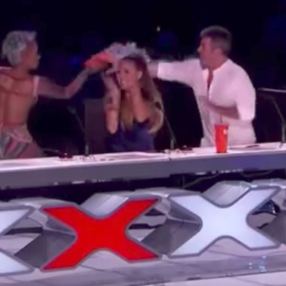 Mel B throws her drink on Simon Cowell. He totally deserved it.
