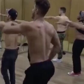 A gaggle of shirtless Brazilians are getting their choreo on point