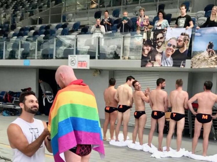 Man proposes to boyfriend at water polo match — with help from some Speedo-clad hotties