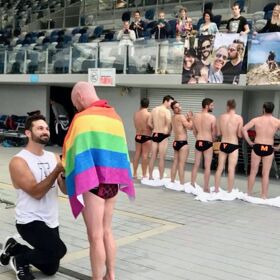 Man proposes to boyfriend at water polo match — with help from some Speedo-clad hotties