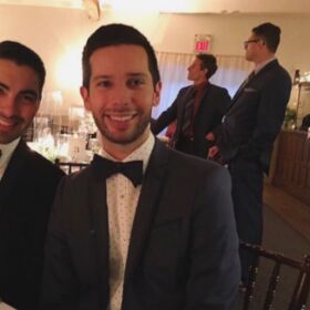 A botched photo of this gay couple at a wedding has delighted the Internet masses