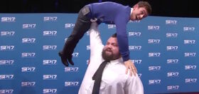 The world’s strongest man just lifted Tom Daley like he was the littlest bug; the smallest worm