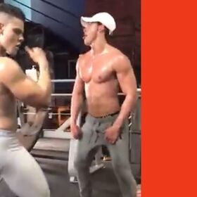 Just some oiled up bros twerking together at the gym, no big deal