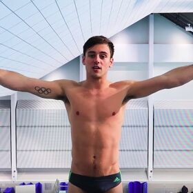 Tom Daley flashes his cakes on the diving board