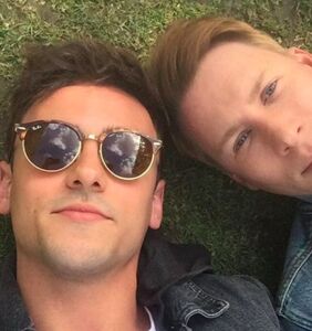 Tom Daley and Dustin Lance Black are bringing a third into their relationship