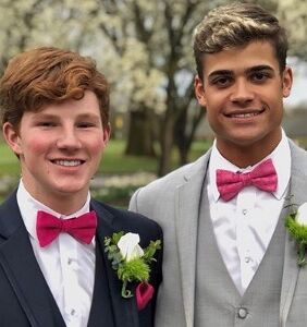 High school football player and swimmer boyfriend share prom pics, melt hearts