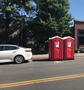Man has homophobic meltdown over two port-a-potties placed outside his restaurant during Pride