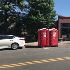 Man has homophobic meltdown over two port-a-potties placed outside his restaurant during Pride