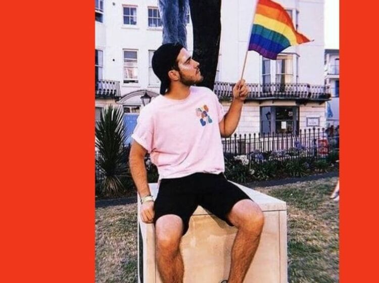 Straight YouTuber hits back at critics after he sits on AIDS memorial for photo op