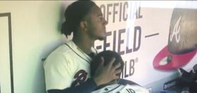 Video of two pro baseball players caught cuddling in the dugout goes viral