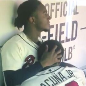 Video of two pro baseball players caught cuddling in the dugout goes viral