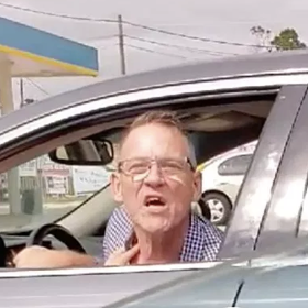 Gay Trump supporter who chased down Latina woman with his car insists he’s “not a racist”