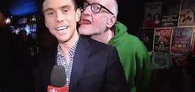 Gay reporter files police report after having ear licked by slobbering comedian on live TV