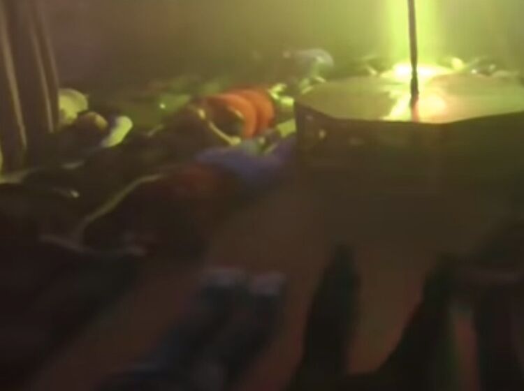 Ukrainian police raid a gay bar, shouting slurs & forcing patrons to lie facedown in the cold
