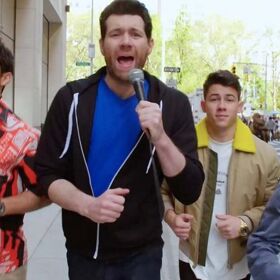 Billy Eichner chases after strangers to inform them the Jonas Brothers are making a comeback