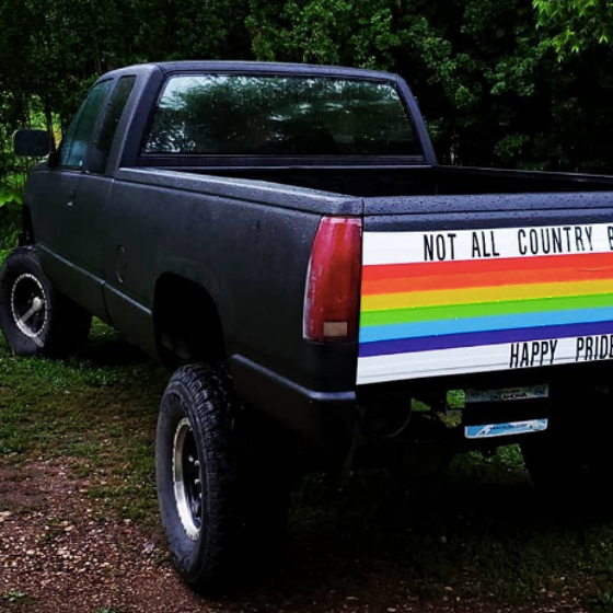 Straight “country boy” paints his truck rainbow colors to bring Pride to the Bible Belt