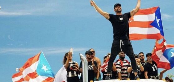 Ricky Martin marches with pride flag against embattled Puerto Rican governor