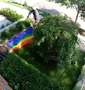 Disturbing video shows unhinged man ripping down Pride flag while shouting antigay slurs