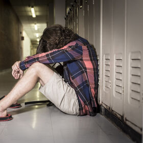 Gay teen beaten by group of boys in locker room while one recorded it