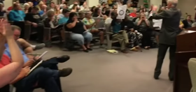 Watch a roomful of people laugh in the face of a “Straight Pride” organizer