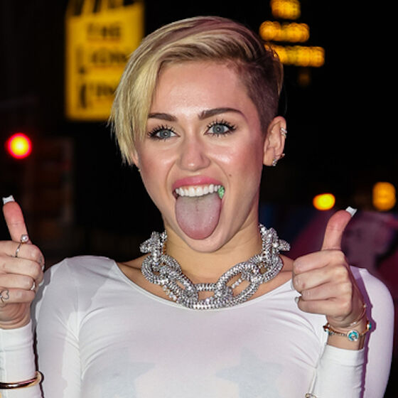 Barely a month after their divorce, Miley Cyrus is already living with their new girlfriend