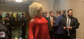 Drag queen arrives in style for first day of Trump’s impeachment hearings
