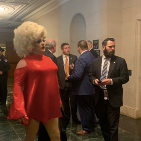 Drag queen arrives in style for first day of Trump’s impeachment hearings