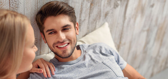 Bi-curious guy unsure how to proceed after girlfriend gives him permission to boink another dude