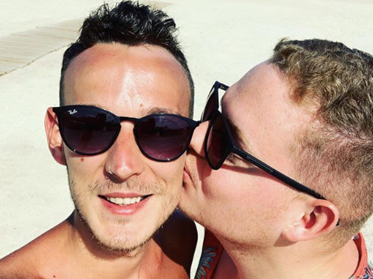 Newlyweds stuck on cruise ship desperate to escape homophobic staff, say their honeymoon is “ruined”