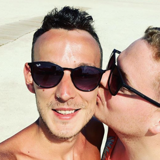 Newlyweds stuck on cruise ship desperate to escape homophobic staff, say their honeymoon is “ruined”