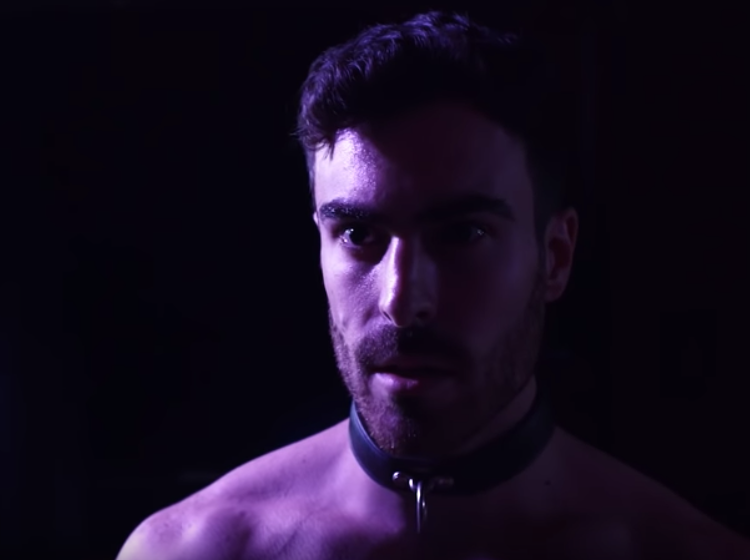 WATCH: Mike Taveira wears a singlet and gets slapped with a leather crop to satisfy his curiosities