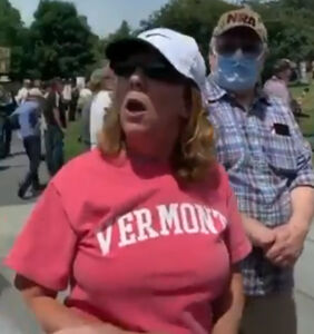 Maskless, racist Karen goes viral after protest meltdown