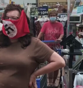 WATCH: Man and woman wear swastika-emblazoned face masks to Walmart
