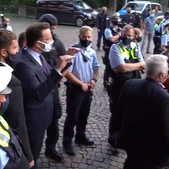WATCH: Out-gay Health Minister cuts speech short after crowd yells “gay pig!”